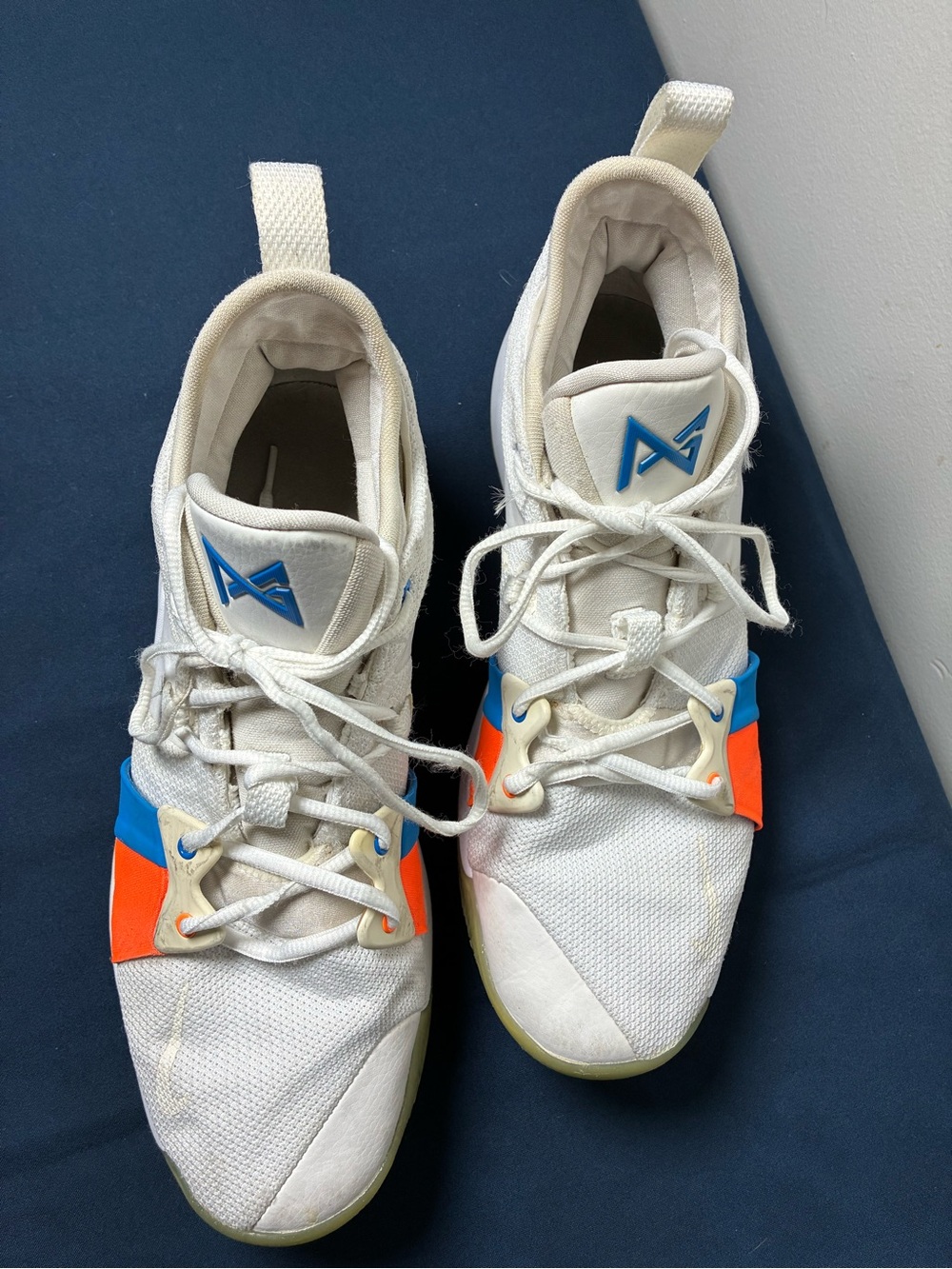Nike White Youth Athletic Sneakers with Blue & Orange Accents